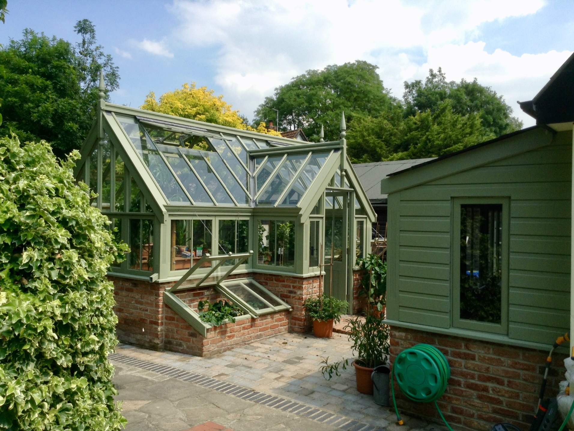 Greenhouse and adjacent potting shed